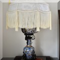 DL05.Porcleain and iron boudoir lamp. 